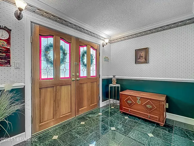 a living room filled with furniture and a table
