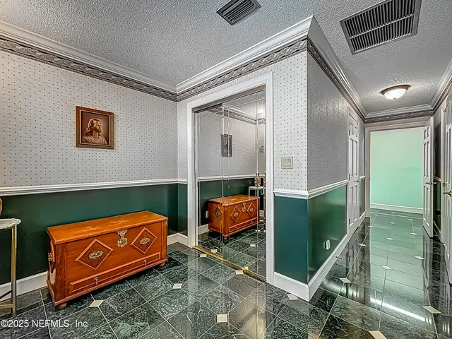 a living room with furniture fireplace and a window
