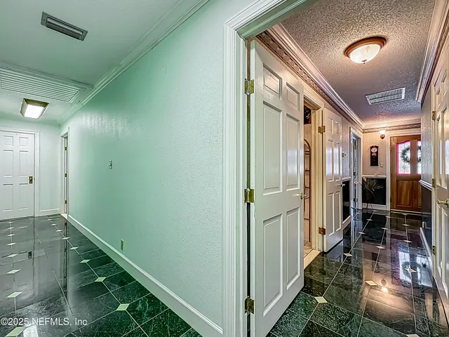a bathroom with a glass door shower