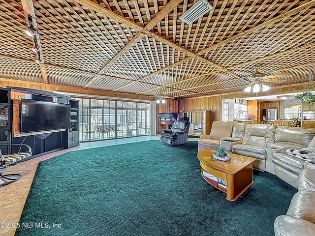 a kitchen with stainless steel appliances granite countertop sink stove top oven and cabinets
