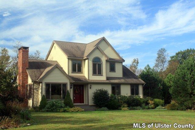 93 Peak Road Stone Ridge, NY 12484 - Photo 1 of 1 a front view of a house with a yard