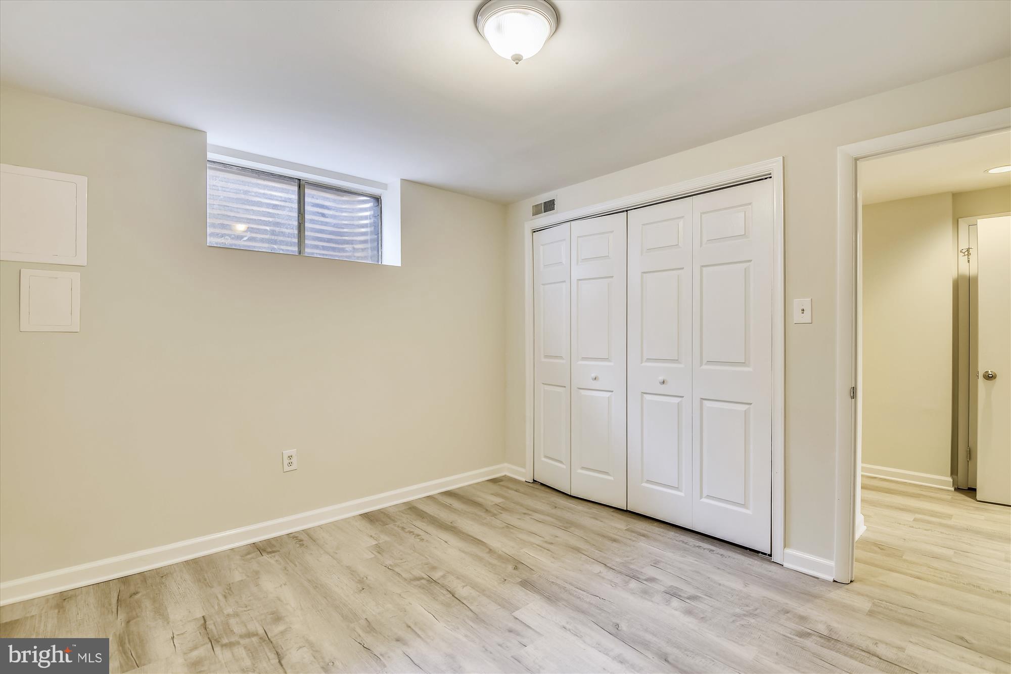 1752 Whitfield Court Crofton, MD 21114 - Photo 18 of 30 a view of an empty room with wooden floor