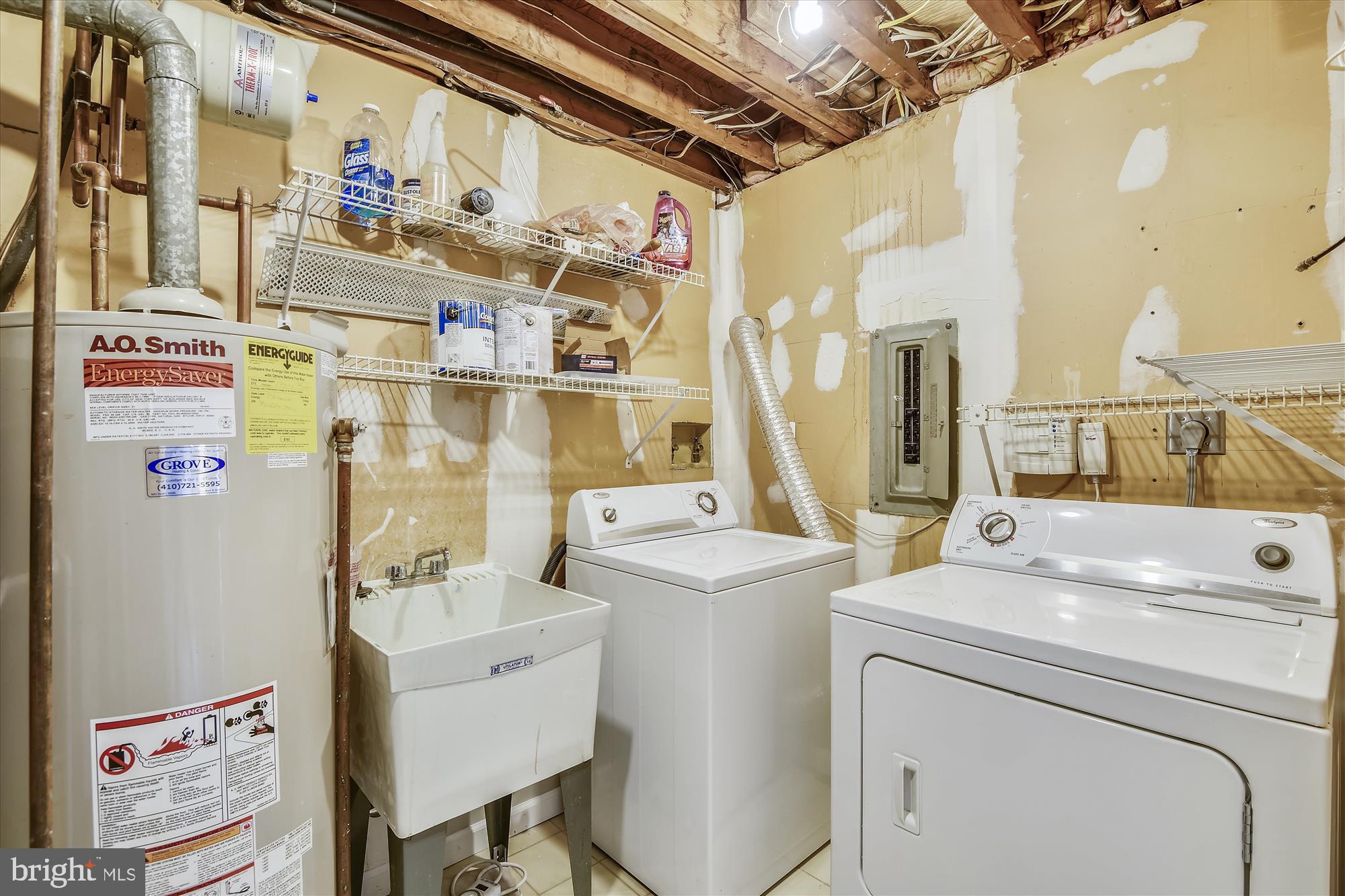 1752 Whitfield Court Crofton, MD 21114 - Photo 20 of 30 a utility room with dryer and washer