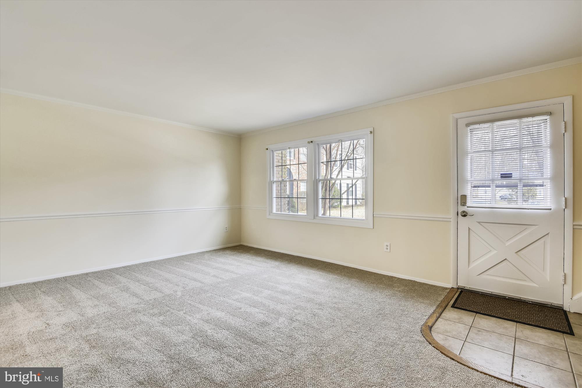 1752 Whitfield Court Crofton, MD 21114 - Photo 2 of 30 an empty room with windows