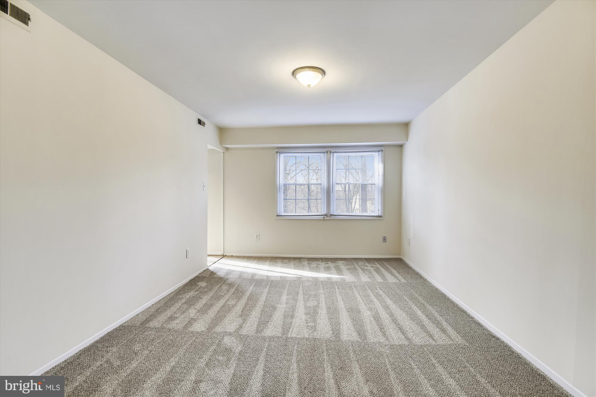 1752 Whitfield Court Crofton, MD 21114 - Photo 5 of 30 an empty room with windows