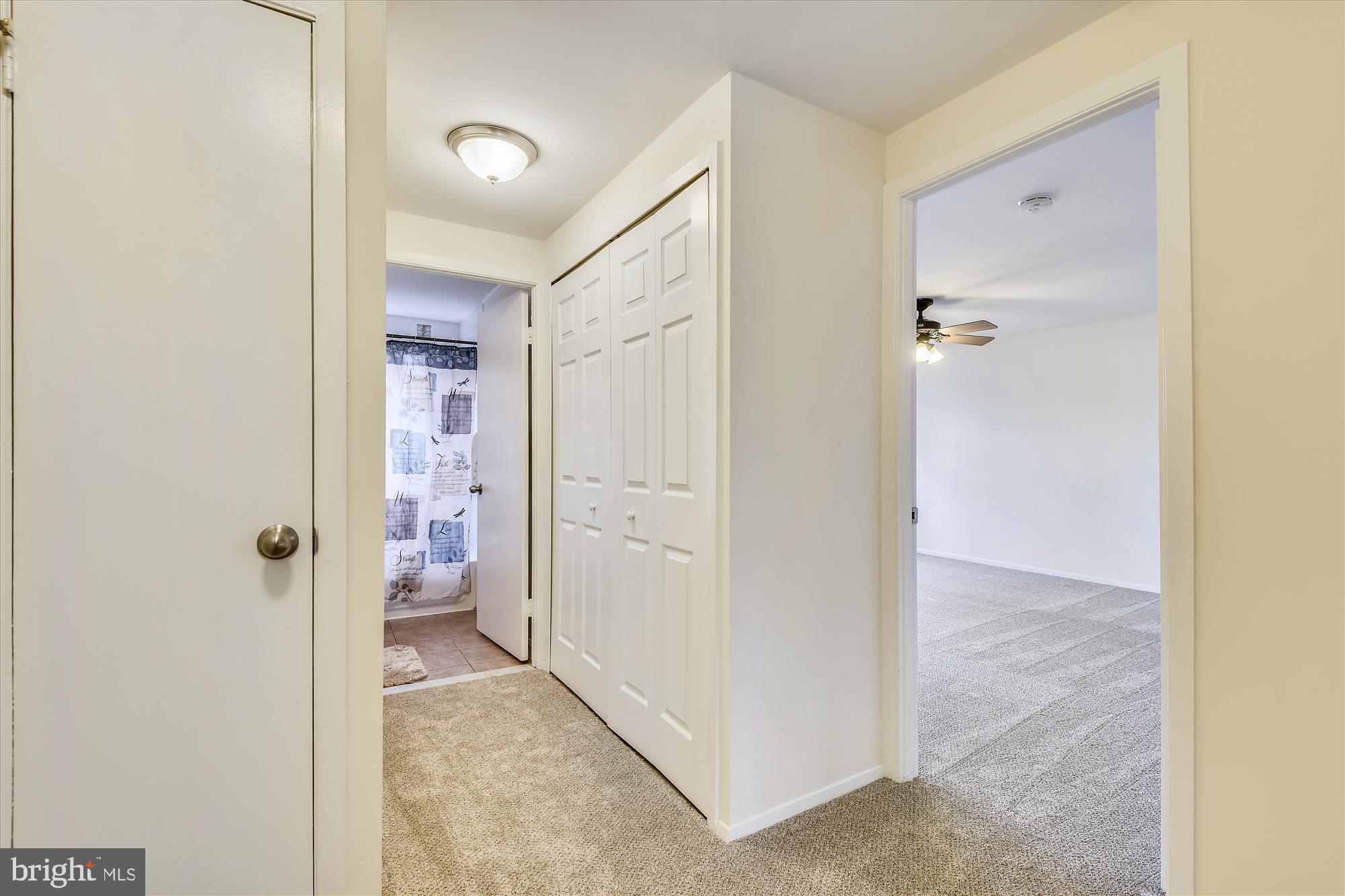 1752 Whitfield Court Crofton, MD 21114 - Photo 10 of 30 a view of a hallway with a wooden cabinets