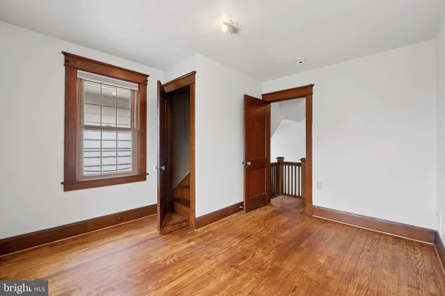 a front view of a houses on the street