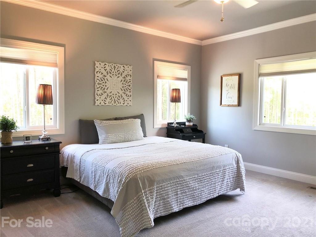 592 Cabin Creek Road Biscoe, NC 27209 - Photo 10 of 20 a bedroom with a bed and window
