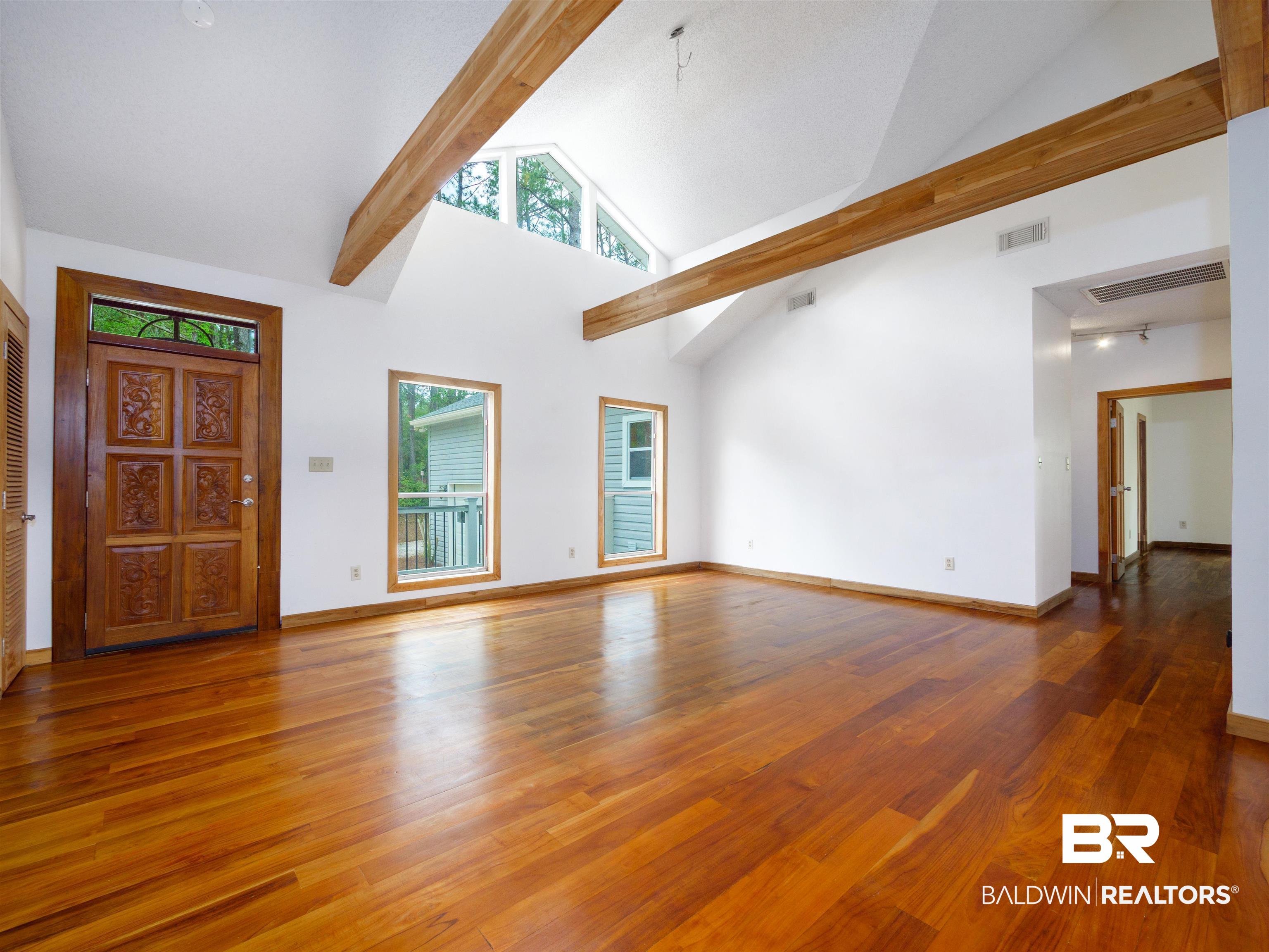 12831 Clay City Road Fairhope, AL 36532 - Photo 6 of 47 Notice the amazing teak flooring and ceiling beams