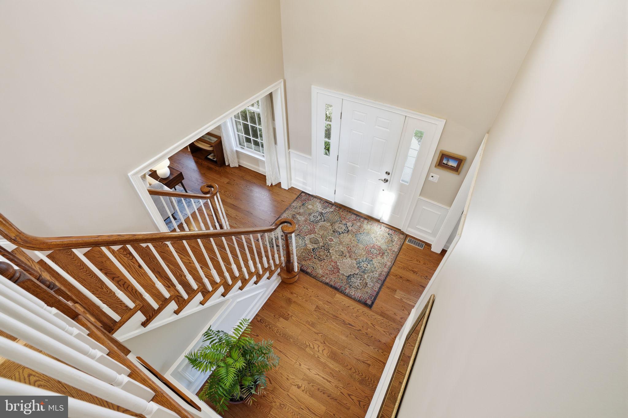 2840 West Fox Chase Circle Doylestown, PA 18902 - Photo 18 of 47 a view of stairs and with floor to ceiling window