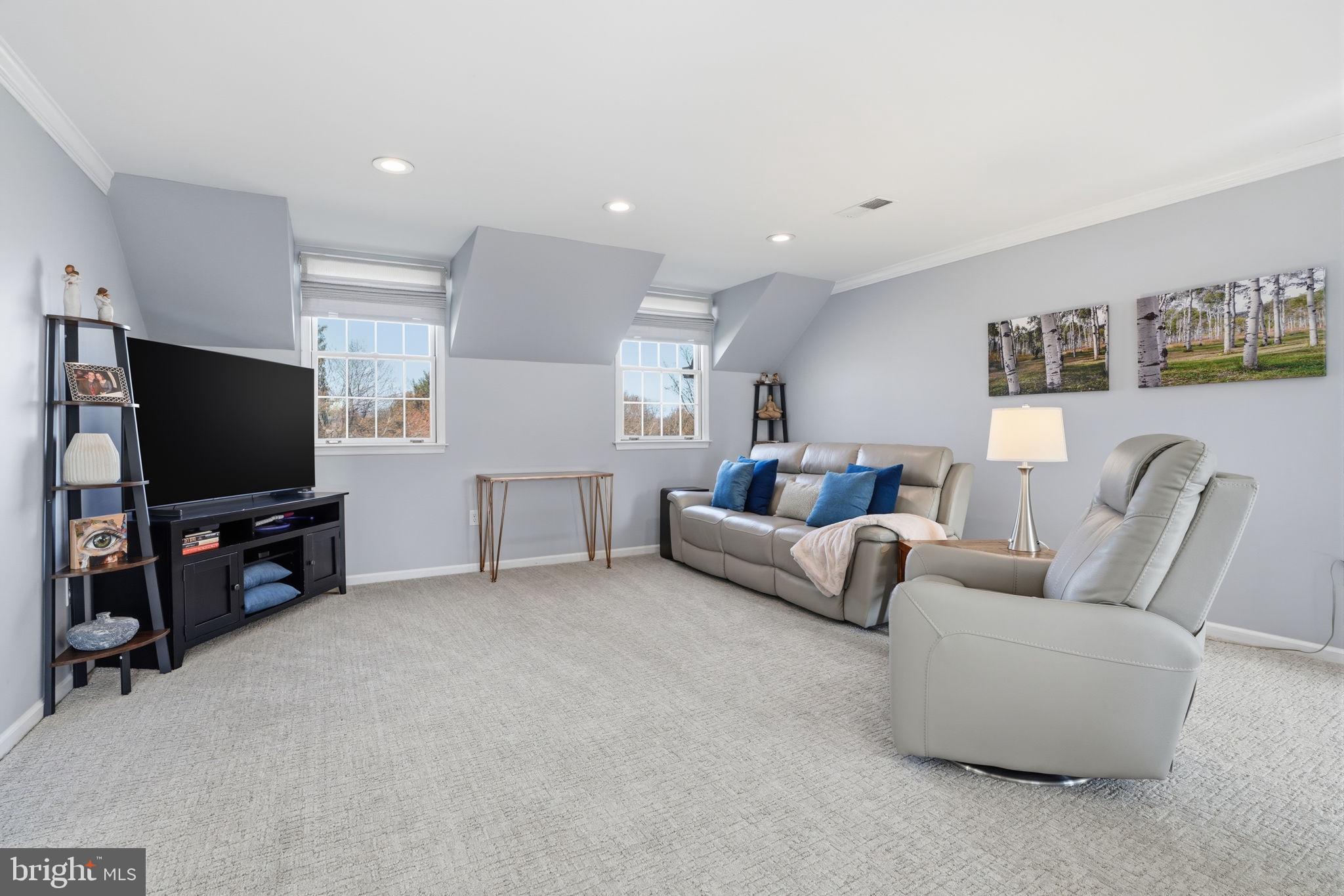 2840 West Fox Chase Circle Doylestown, PA 18902 - Photo 22 of 47 a living room with furniture and a flat screen tv