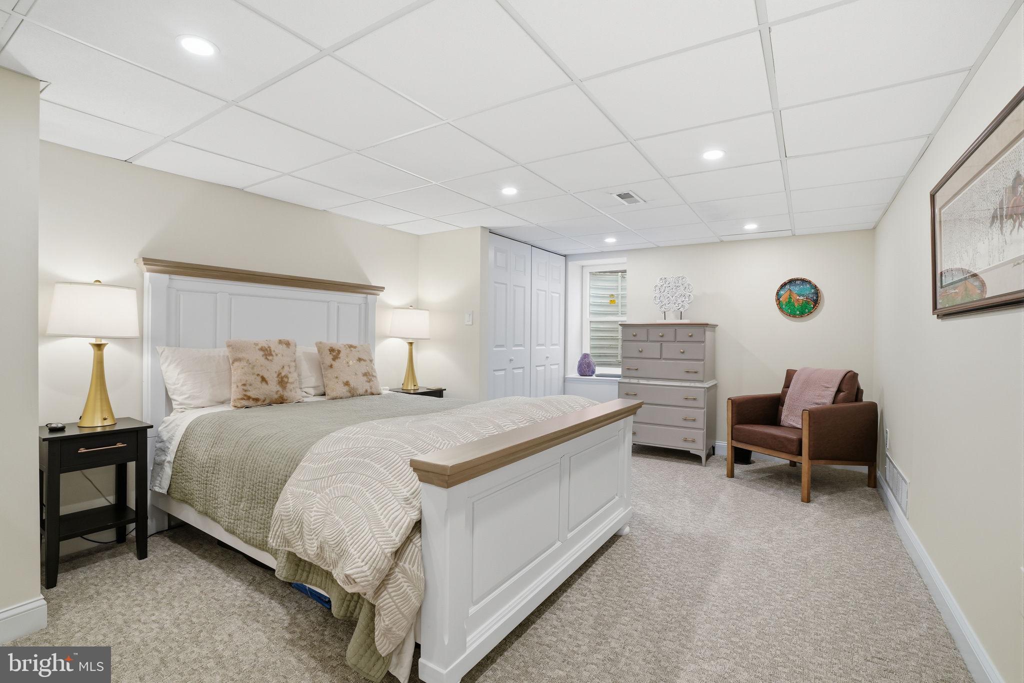 2840 West Fox Chase Circle Doylestown, PA 18902 - Photo 35 of 47 a spacious bedroom with a bed and furniture