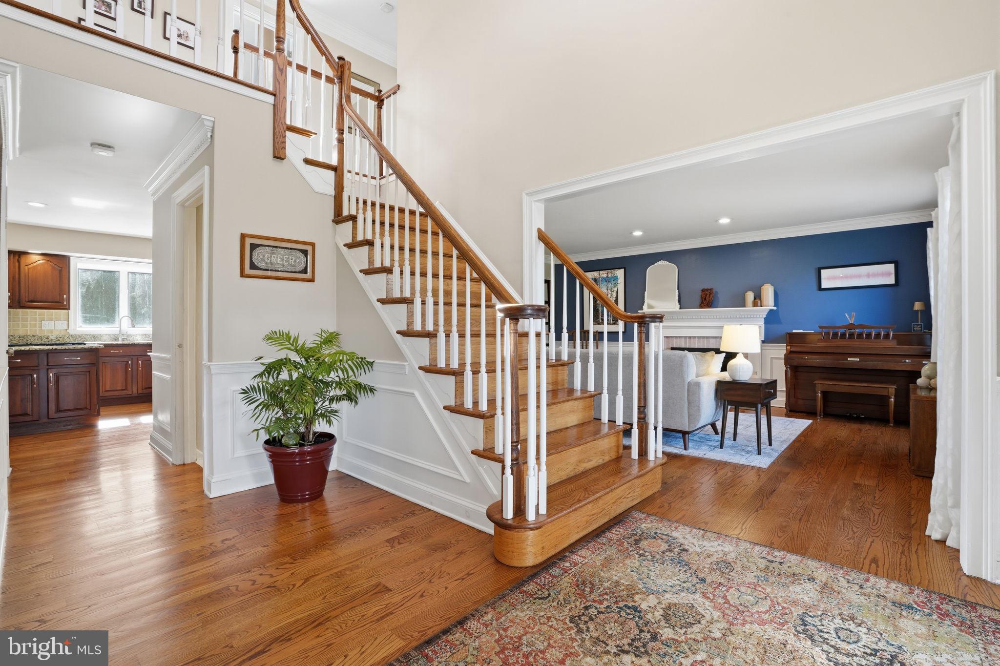 2840 West Fox Chase Circle Doylestown, PA 18902 - Photo 4 of 47 a view of entryway dining room and hall with wooden floor
