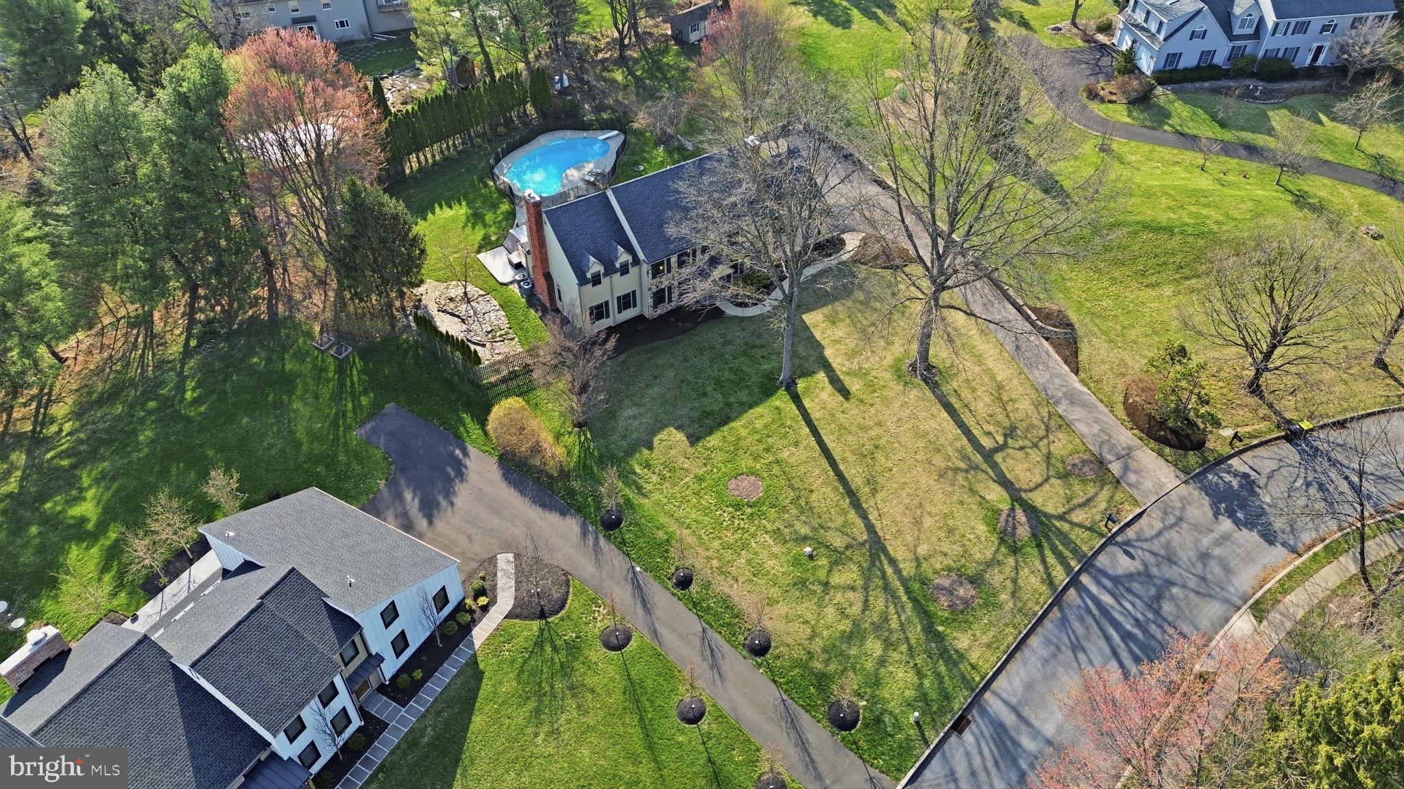 2840 West Fox Chase Circle Doylestown, PA 18902 - Photo 46 of 47 an aerial view of a house with swimming pool and large trees