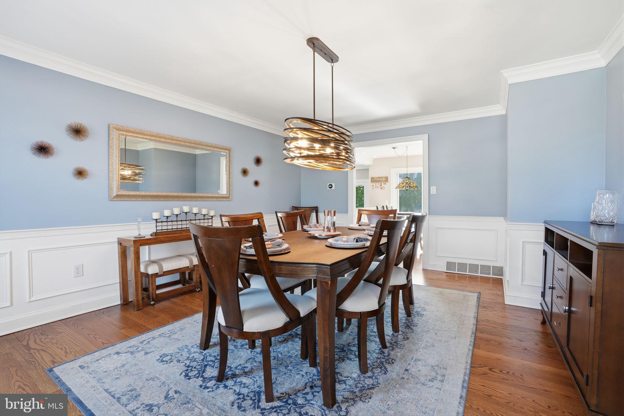 2840 West Fox Chase Circle Doylestown, PA 18902 - Photo 7 of 47 a view of a dining room with furniture window and wooden floor