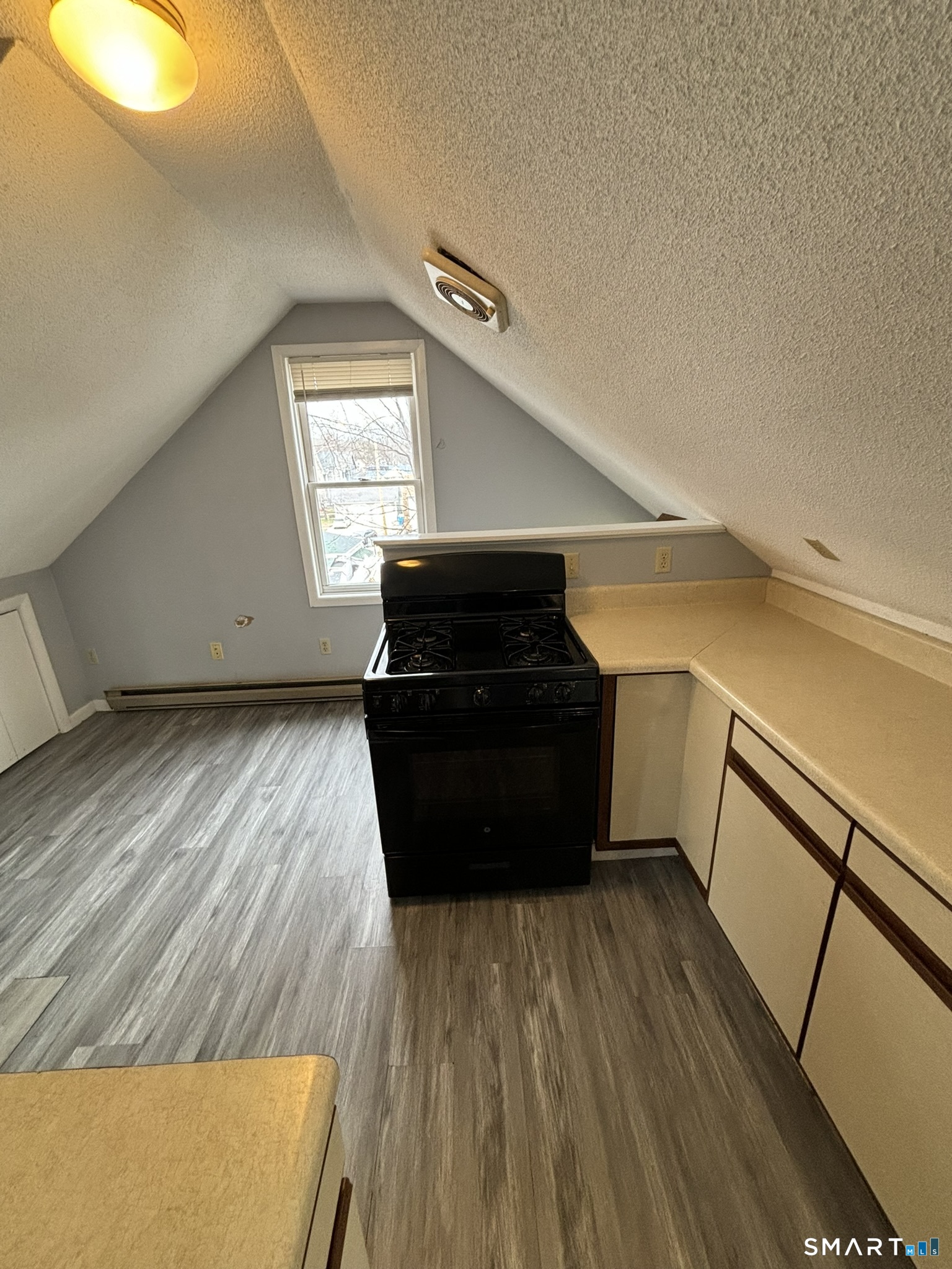 11 Roberts Street, Unit 3 Bristol, CT 06010 - Photo 10 of 11 a view of entryway with wooden floor