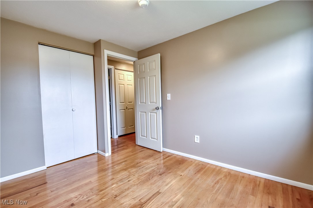 5618 Dolphin Road Mentor, OH 44060 - Photo 26 of 46 Unfurnished bedroom featuring light wood finished floors and a closet