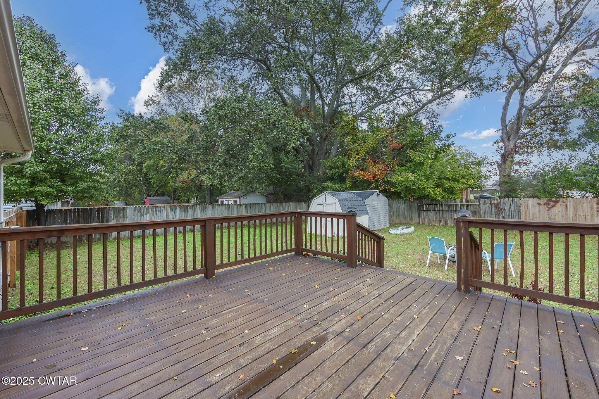 46 Commanche Cove Jackson, TN 38305 - Photo 25 of 26 a view of a deck with a large window and wooden floor