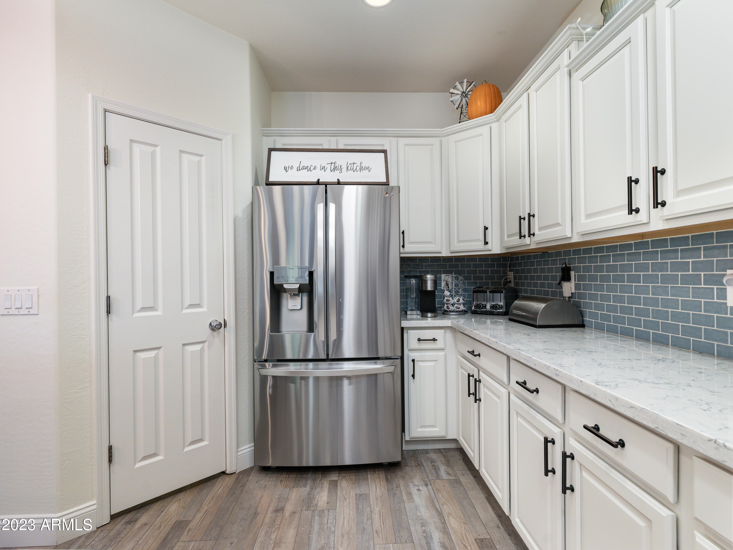 4614 East Ruffian Road Gilbert, AZ 85297 - Photo 17 of 63 Fresh Backsplash Accents the Kitchen