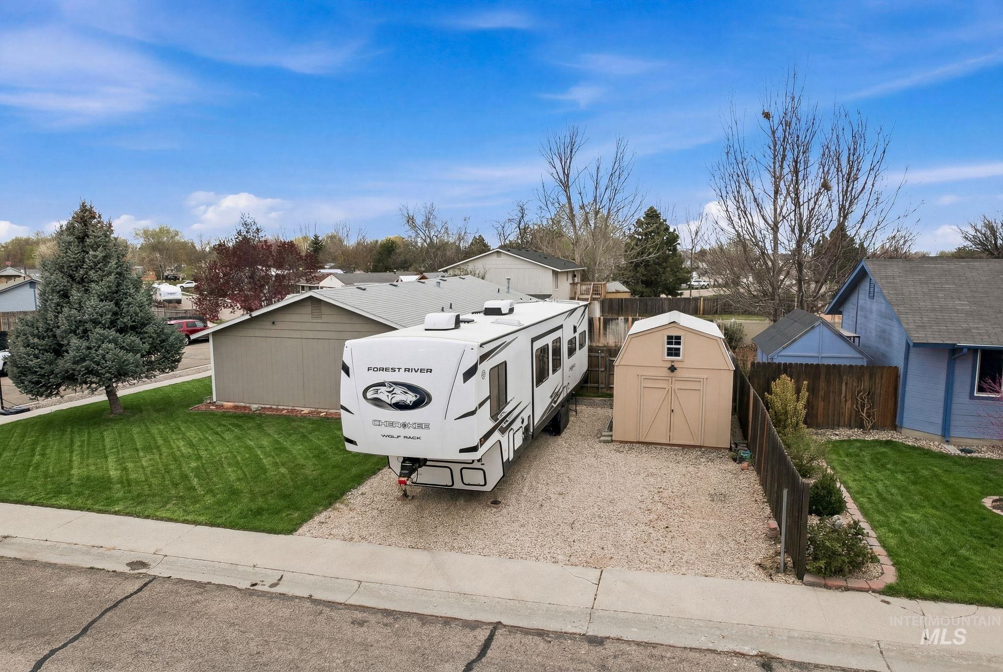 598 Easy Street Kuna, ID 83634 - Photo 42 of 50 View of front facade with a storage unit and a residential view