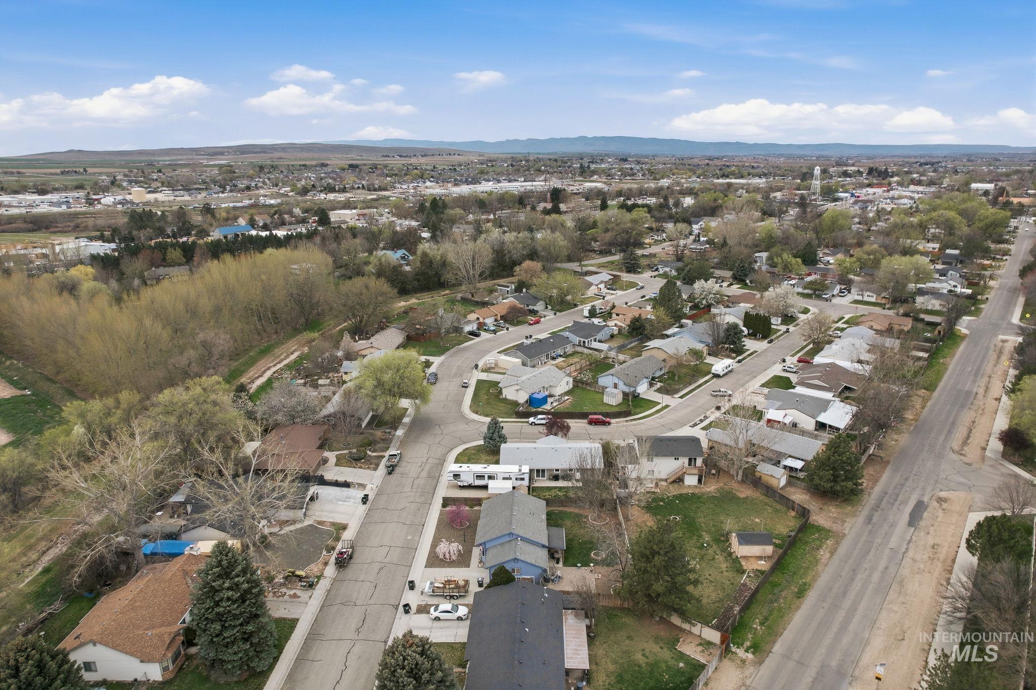 598 Easy Street Kuna, ID 83634 - Photo 48 of 50 Aerial view of residential area with a mountain backdrop