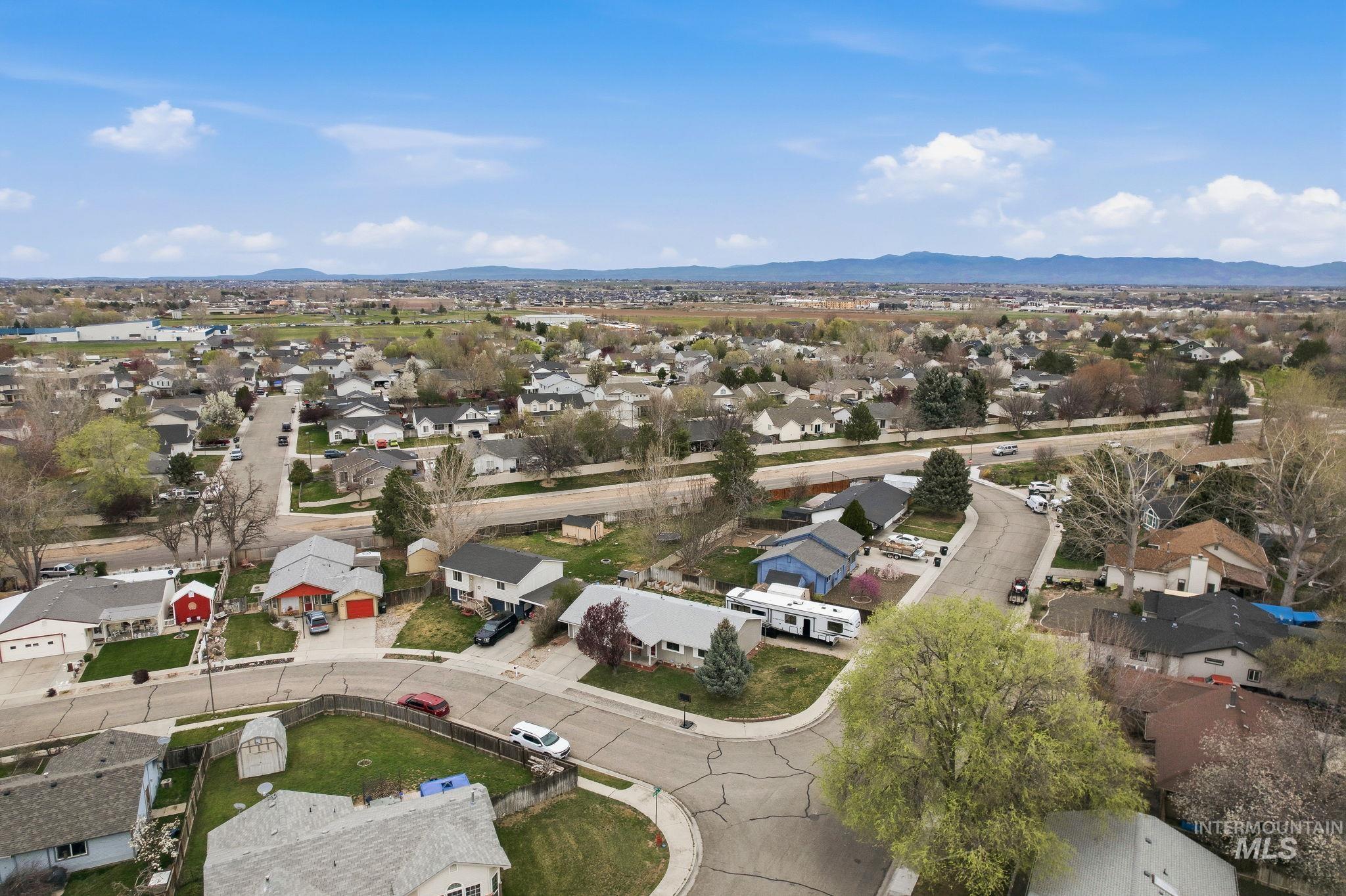 598 Easy Street Kuna, ID 83634 - Photo 50 of 50 Aerial view of residential area with a mountainous background