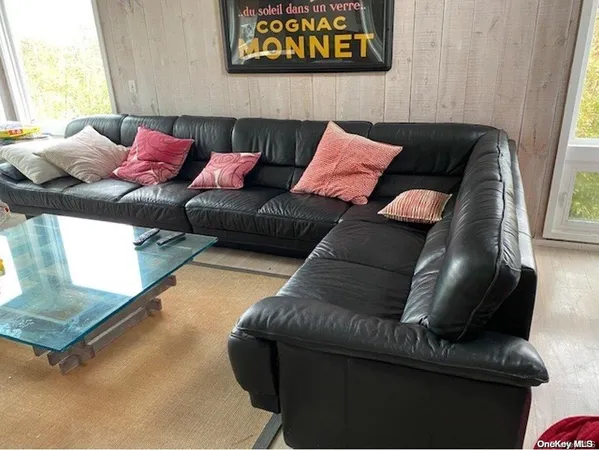 a living room with furniture and a couch