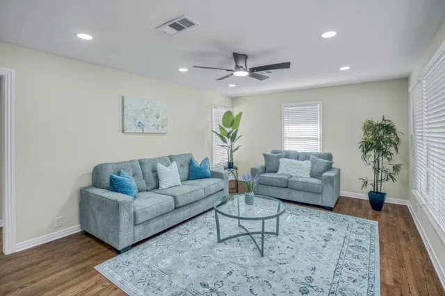 a living room with furniture and a couch