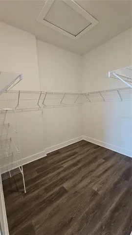 a view of a room with racks on the wall