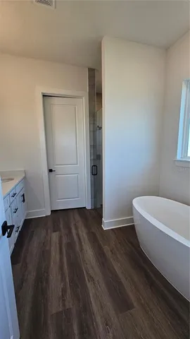 a bathroom with a sink and a bathtub