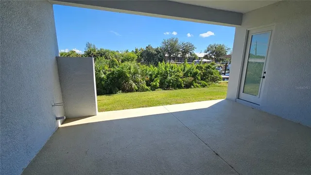 a view of a room with a garden and plants