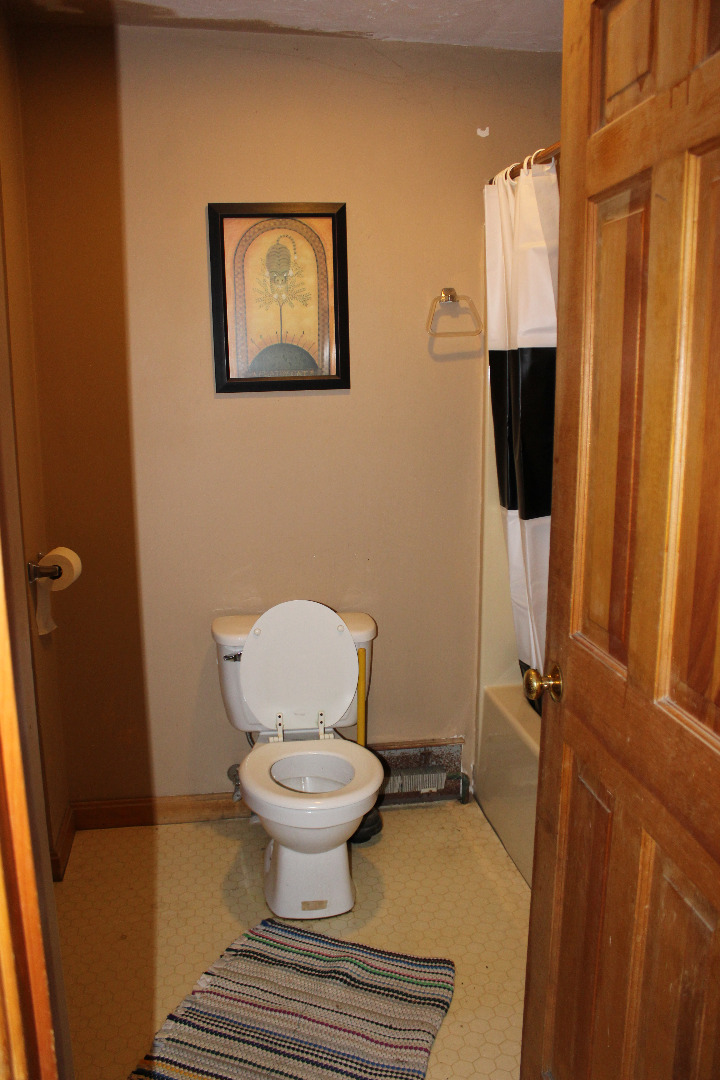 5 Pamela Way Edgartown, MA 02539 - Photo 7 of 12 a bathroom with a toilet and a mirror