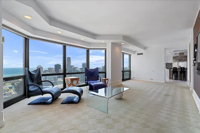 a bedroom with bed and sliding window