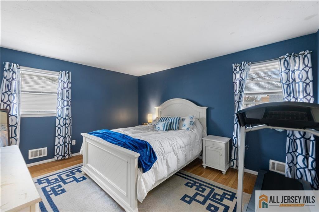 33 Prospect Lane Colonia, NJ 07067 - Photo 20 of 35 a bedroom with a bed and a window