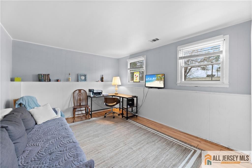 33 Prospect Lane Colonia, NJ 07067 - Photo 23 of 35 a bedroom with furniture and a window