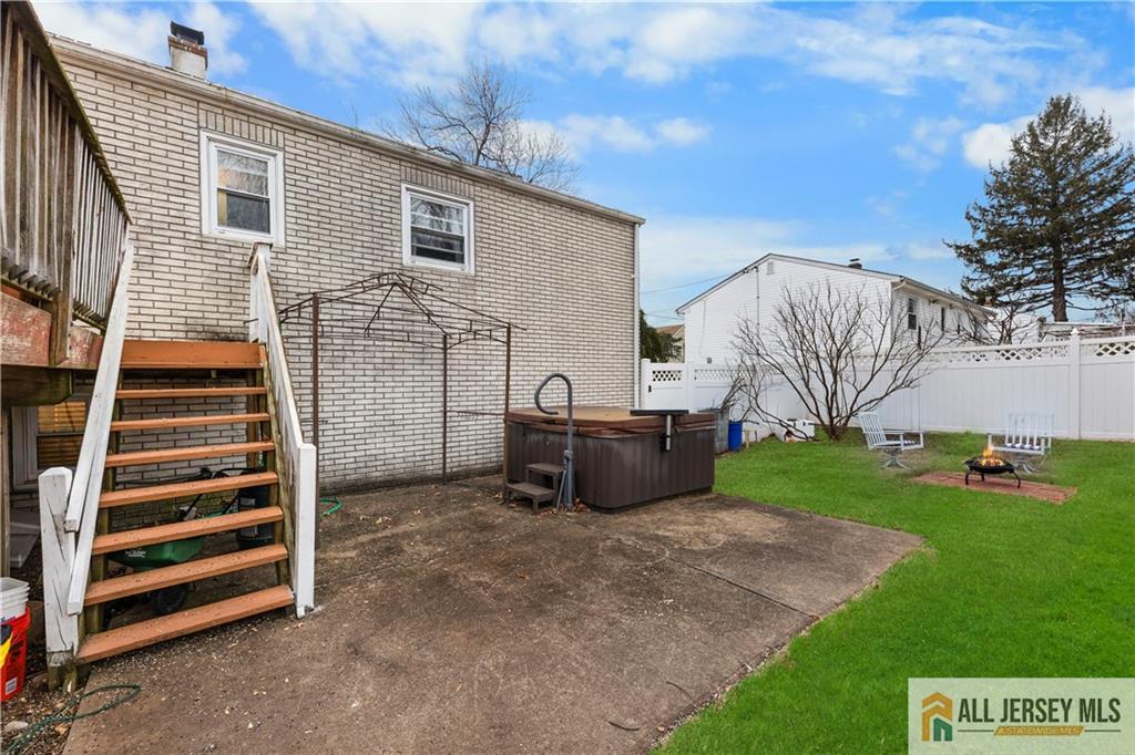 33 Prospect Lane Colonia, NJ 07067 - Photo 30 of 35 a front view of a house with a yard