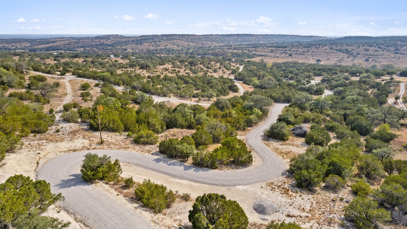 340 Ranch View Road Spicewood, TX 78669 - Photo 2 of 40 an aerial view of a house with a yard