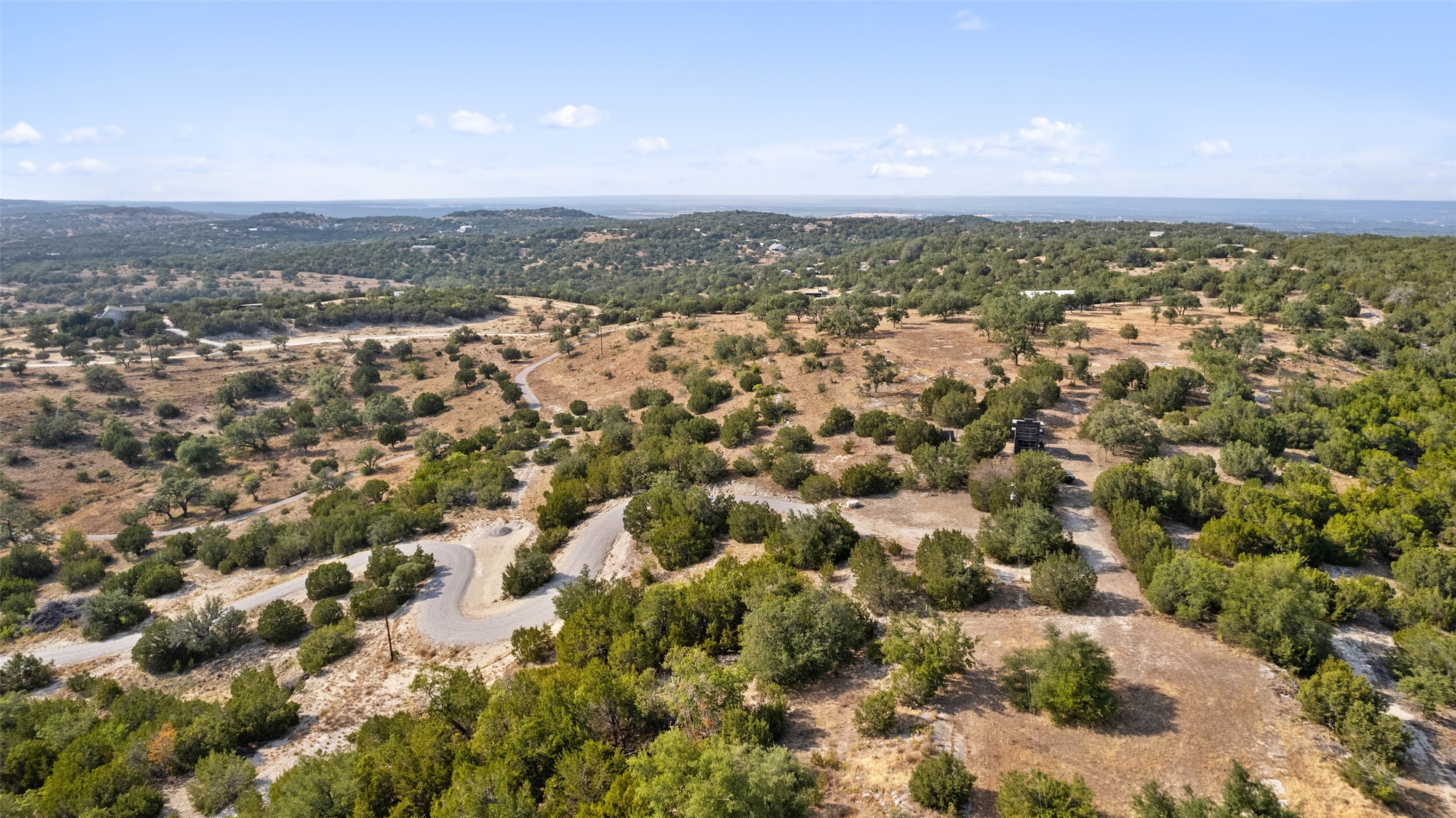 340 Ranch View Road Spicewood, TX 78669 - Photo 29 of 40 an aerial view of residential building and trees around