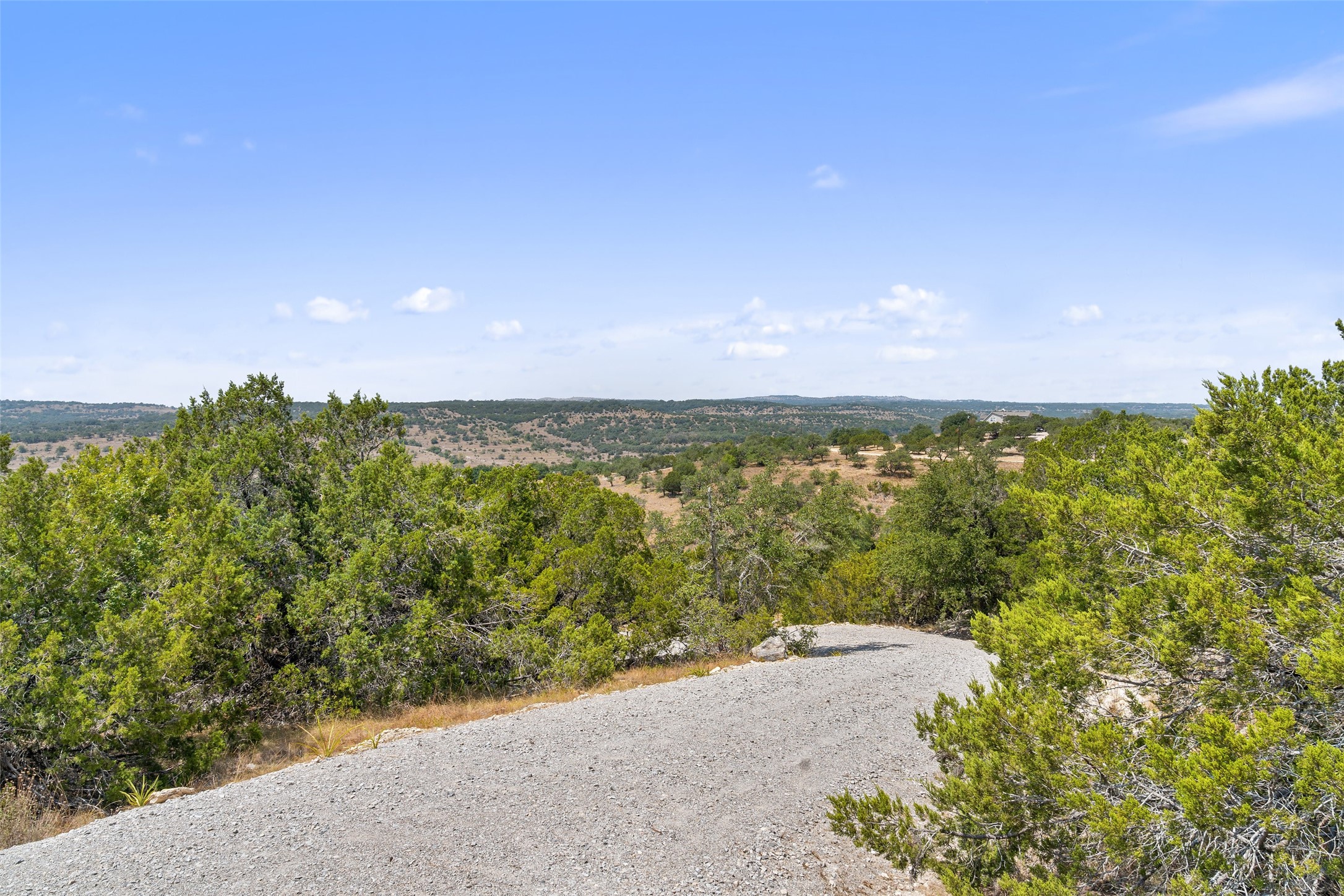 340 Ranch View Road Spicewood, TX 78669 - Photo 33 of 40 a view of a lake with a city