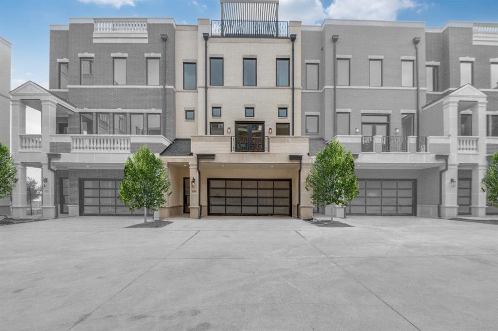 250 East Dallas Road, Unit 119 Grapevine, TX 76051 - Photo 2 of 40 front view of a building with a yard