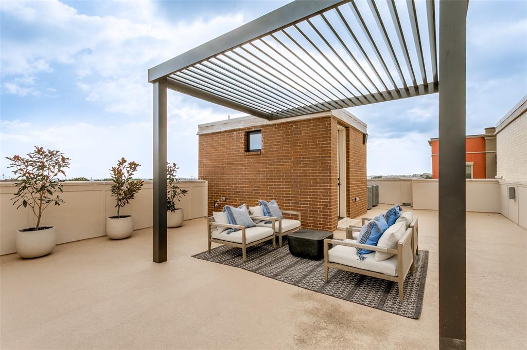 250 East Dallas Road, Unit 119 Grapevine, TX 76051 - Photo 29 of 40 a balcony with furniture and a couch