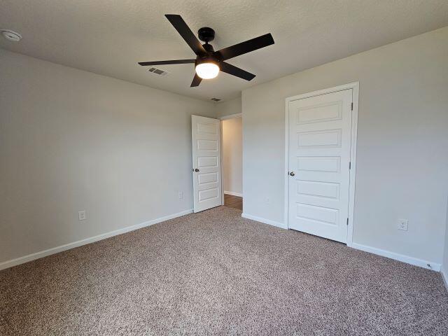 320 Flounder Street Crestview, FL 32539 - Photo 17 of 41 an empty room with closet and ceiling fan