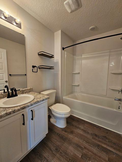320 Flounder Street Crestview, FL 32539 - Photo 18 of 41 a bathroom with a granite countertop sink toilet a mirror and shower