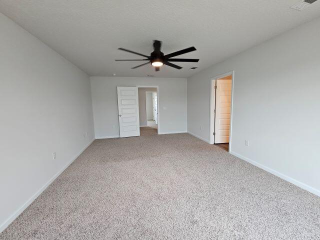 320 Flounder Street Crestview, FL 32539 - Photo 24 of 41 a view of a livingroom with a ceiling fan and hardwood floor