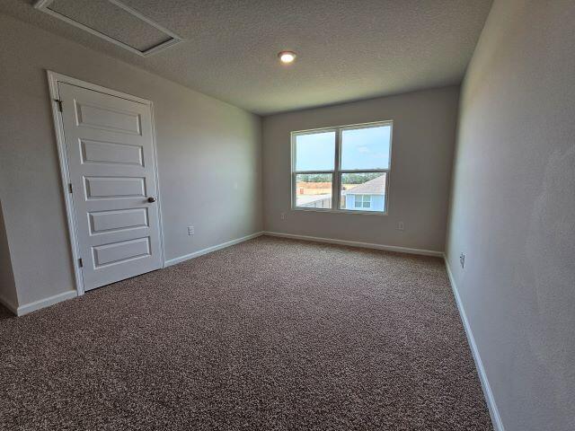 320 Flounder Street Crestview, FL 32539 - Photo 30 of 41 an empty room with windows