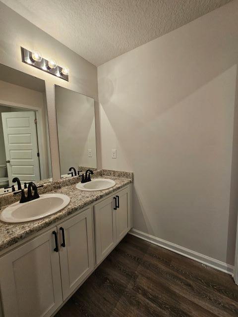 320 Flounder Street Crestview, FL 32539 - Photo 36 of 41 a spacious bathroom with a double vanity sink and a mirror
