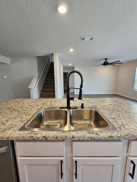 320 Flounder Street Crestview, FL 32539 - Photo 8 of 41 a sink with granite top and a sink
