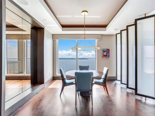 a view of balcony with wooden floor