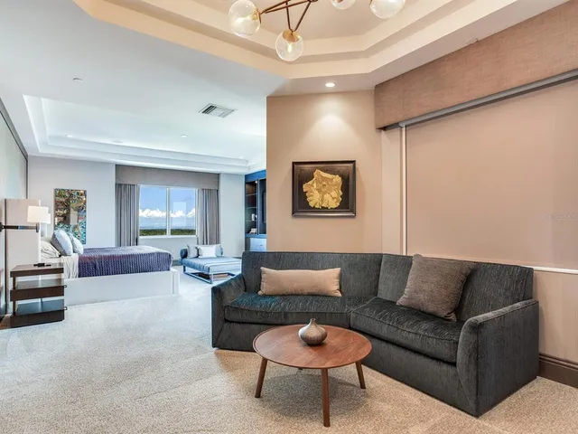 a kitchen with stainless steel appliances granite countertop a stove sink and cabinets