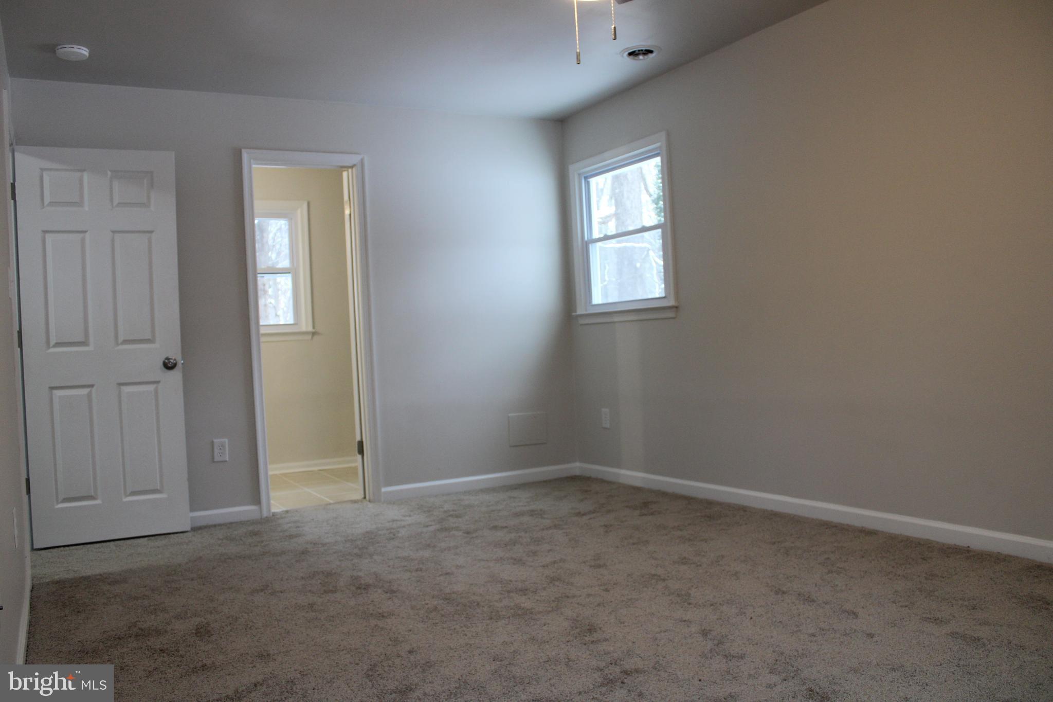 11816 Rutherford Drive Fredericksburg, VA 22407 - Photo 16 of 22 an empty room that has a window